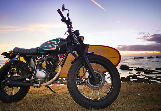 istock Motorcycle with surfboard at outdoors 532580259