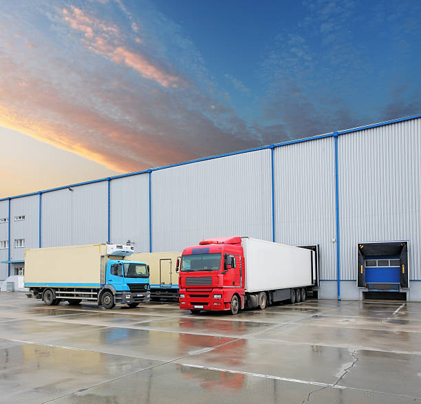 istock Cargo truck at warehouse building 532580297