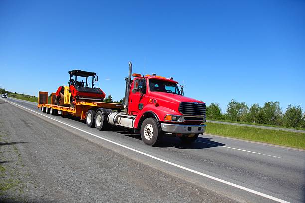 Semi-truck being driven on highway.  