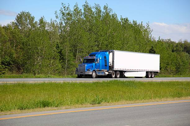 istock Semi-truck being driven on highway 532580513