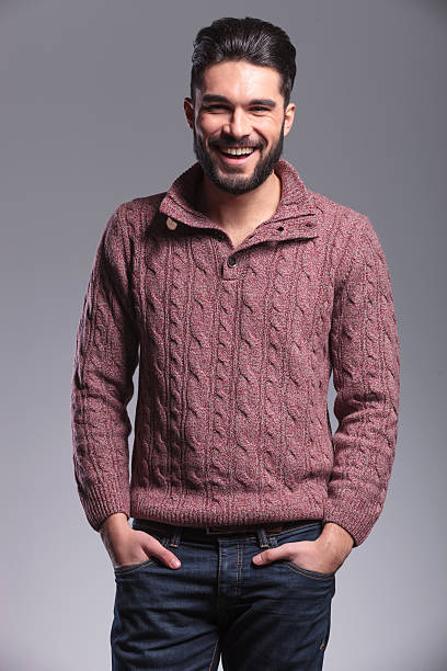 istock young man laughing while holding his hands in pocket 532594037