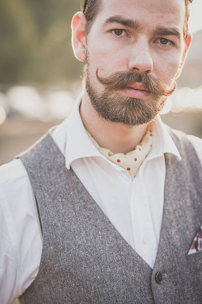 istock handsome big moustache hipster man 532604719