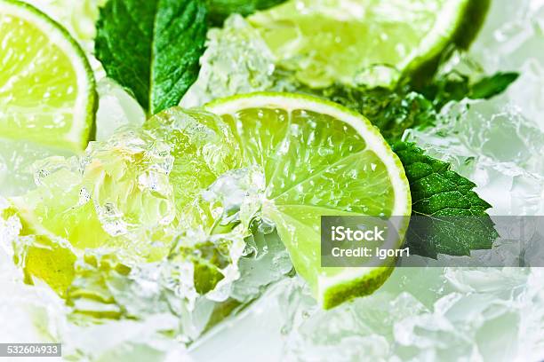 Lime Slices And Peppermint Stock Photo - Download Image Now - 2015, Backgrounds, Citrus Fruit