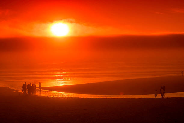 istock People on the beach at the sunset, Oregon Coast 532605111