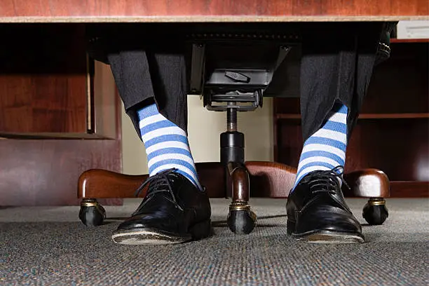 Photo of Businessman with striped socks