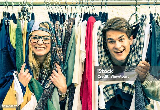 Young Funny Couple In Love At The Weekly Cloth Market Stock Photo - Download Image Now