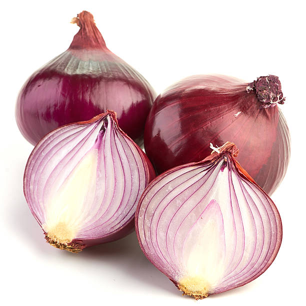 istock Red sliced onion isolated on white background 532608889
