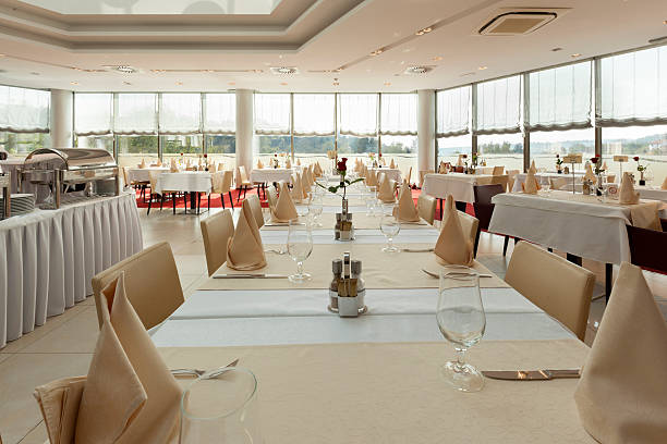 istock Bright restaurant interior with tables arranged for special even 532623327