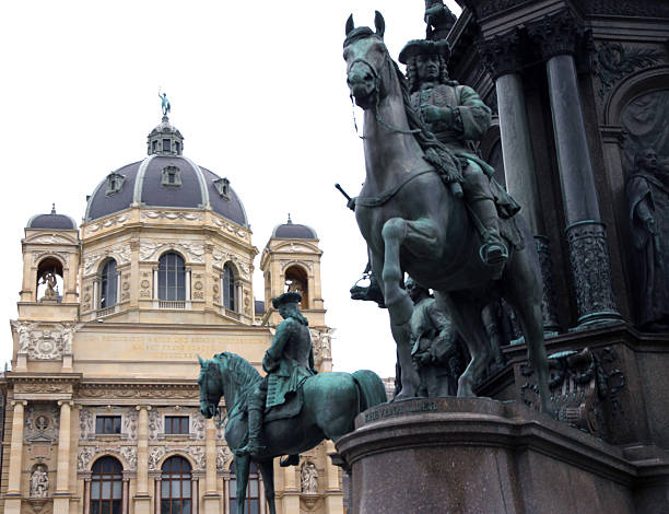 istock equestrian statue with Knight and Palace  vienna 532624675