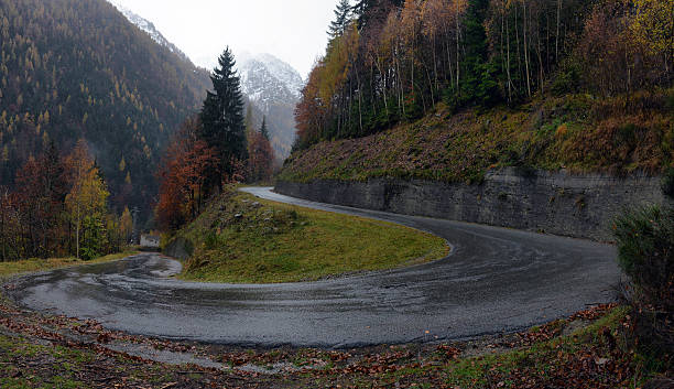 istock mountain road in the Alps 532625453