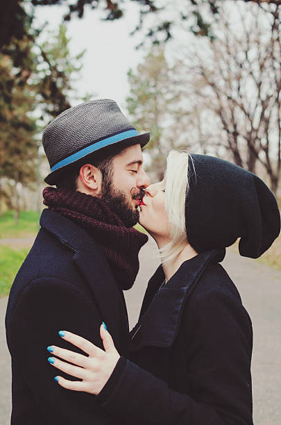 istock Young Hipster couple kissing 532626483