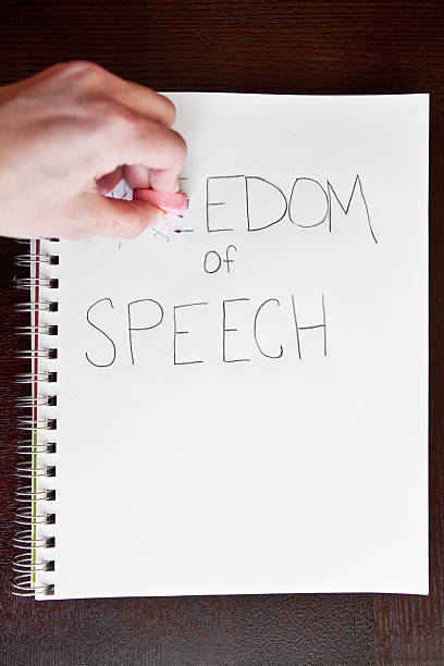 istock Hand Erasing The Word Freedom 532626755