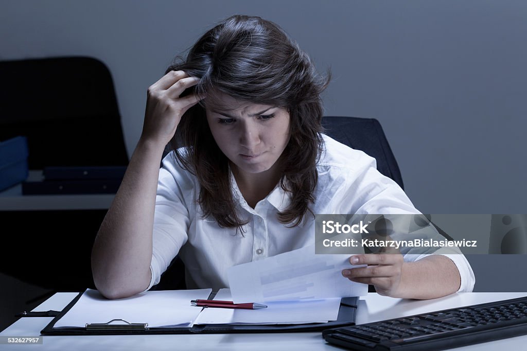 Businesswoman in white shirt Businesswoman in white shirt working in the office 2015 Stock Photo