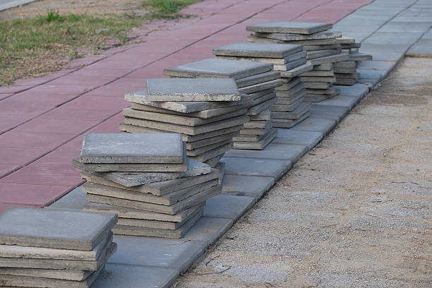 istock Concrete stones for the sidewalk pavement, concrete bricks. Sele 532641471