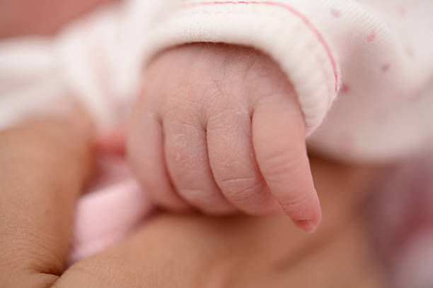 istock newborn baby hand 532643587