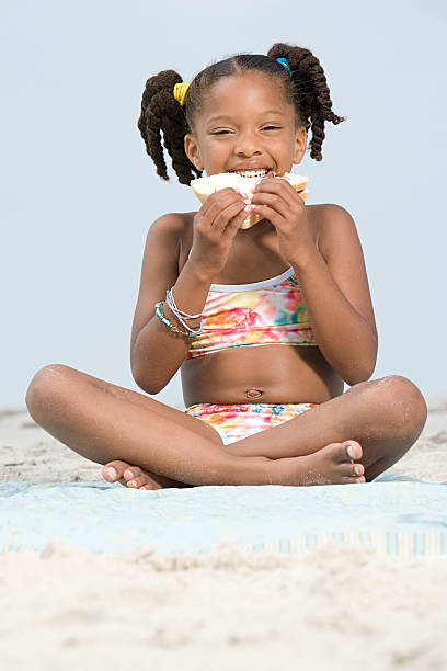 istock Girl eating sandwich 532645249