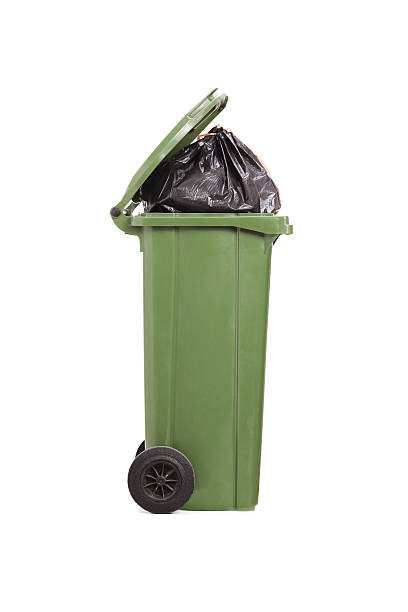 istock Studio shot of a trash can full of garbage 532646631