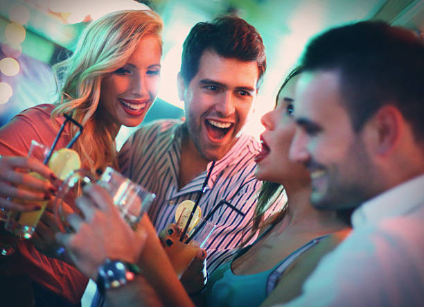 istock Group of young adults on a night out. 532646835