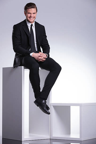 istock young business man holding his hands together 532648665