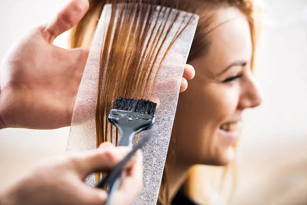 Close up of a hair dyeing.