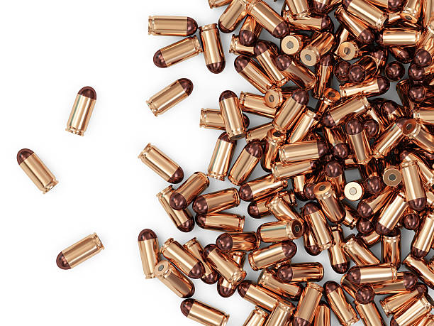 istock Heap of Gun Bullets isolated on white background 532664795