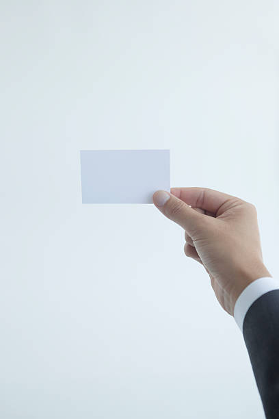 istock Hand of business man with a card 532670643