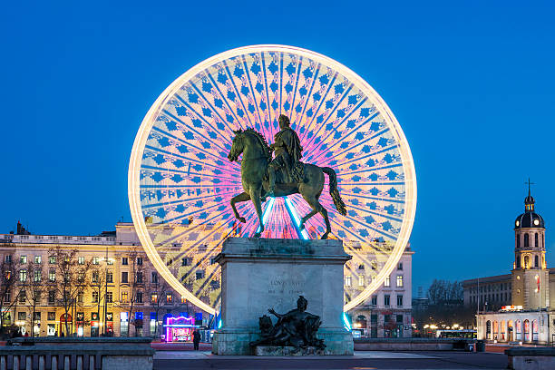Place Bellecour, famous statue of King Louis XIV by night Place Bellecour statue of King Louis XIV by night, Lyon France lyon photos stock pictures, royalty-free photos & images