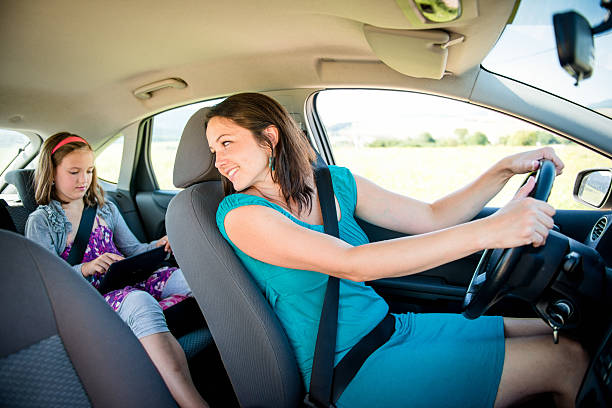 istock Mother and child in car 532681591