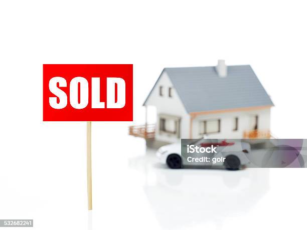 Sold Sign In Front Of House Stock Photo - Download Image Now - 2015, Achievement, Advertisement