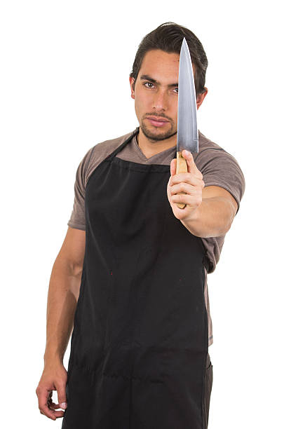 istock handsome young male chef wearing black apron 532683095