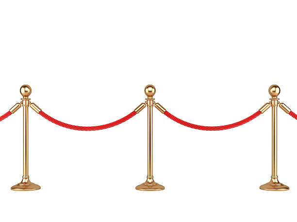 istock gold stanchions with rope 532683499