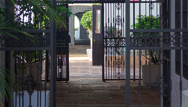 istock Typical entrance to a courtyard, with bars, Malaga Spain 532684695