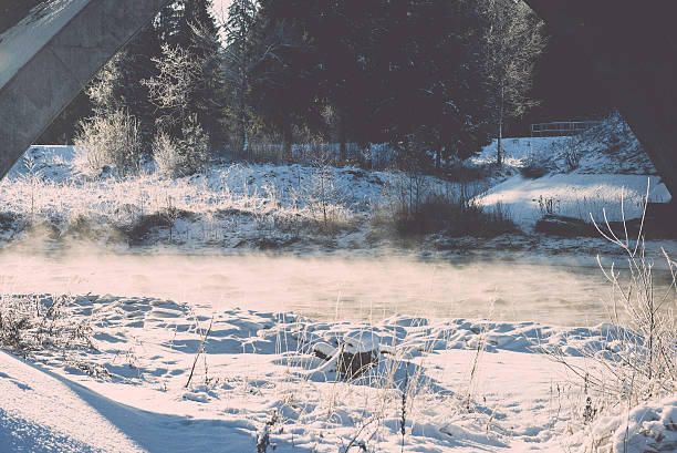 istock snowy winter river landscape with snow covered trees - retro 532685271