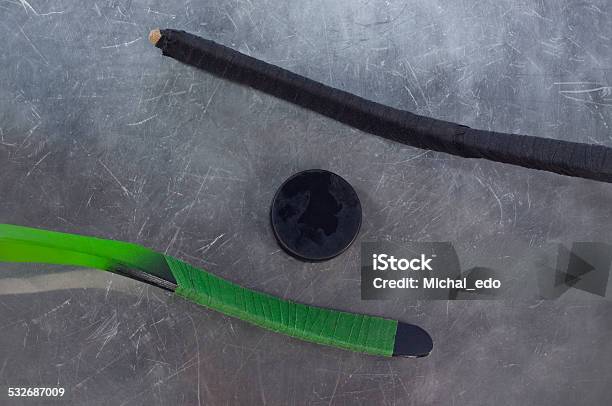 Hockey Stick And Puck On Ice Stock Photo - Download Image Now - 2015, Activity, Adult