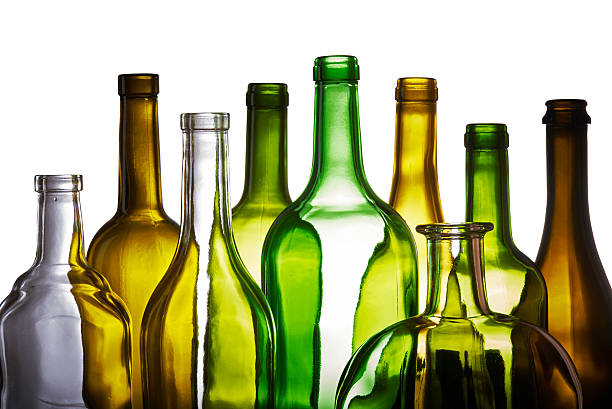 Set of Empty Bottles isolated on white background Set of wine and brandy Empty bottles. On a white background a few empty wine bottles, bottles of whiskey and brandy.  Transparent bottle, dark green and dark brown. Visible silhouettes bottles. bottle empty nobody glass stock pictures, royalty-free photos & images