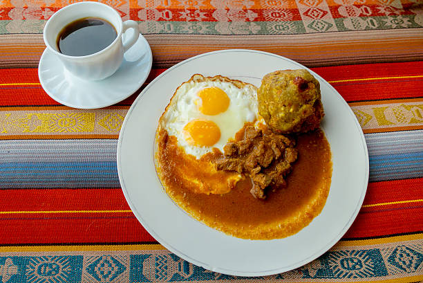 istock Bolon de verde with fried egg and meat stew ecuadorian 532699479