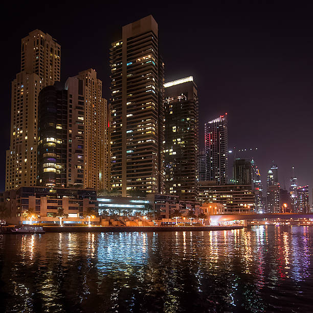 United Arab Emirates: Skyscrapers of Dubai Marina at night stock photo