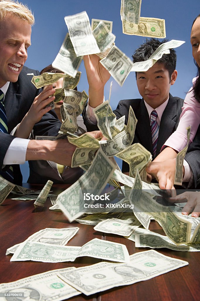 Businesspeople throwing money Anger Stock Photo