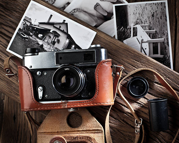 istock Old rangefinder camera and black-and-white photos. 532701547