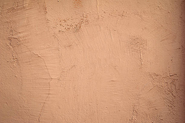 istock Texture of old wall covered with pink stucco 532701635