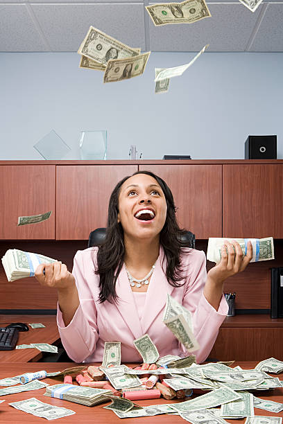 istock Businesswoman throwing money 532701763