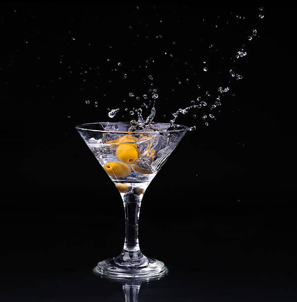 istock Vermouth cocktail inside martini glass over dark background 532702147