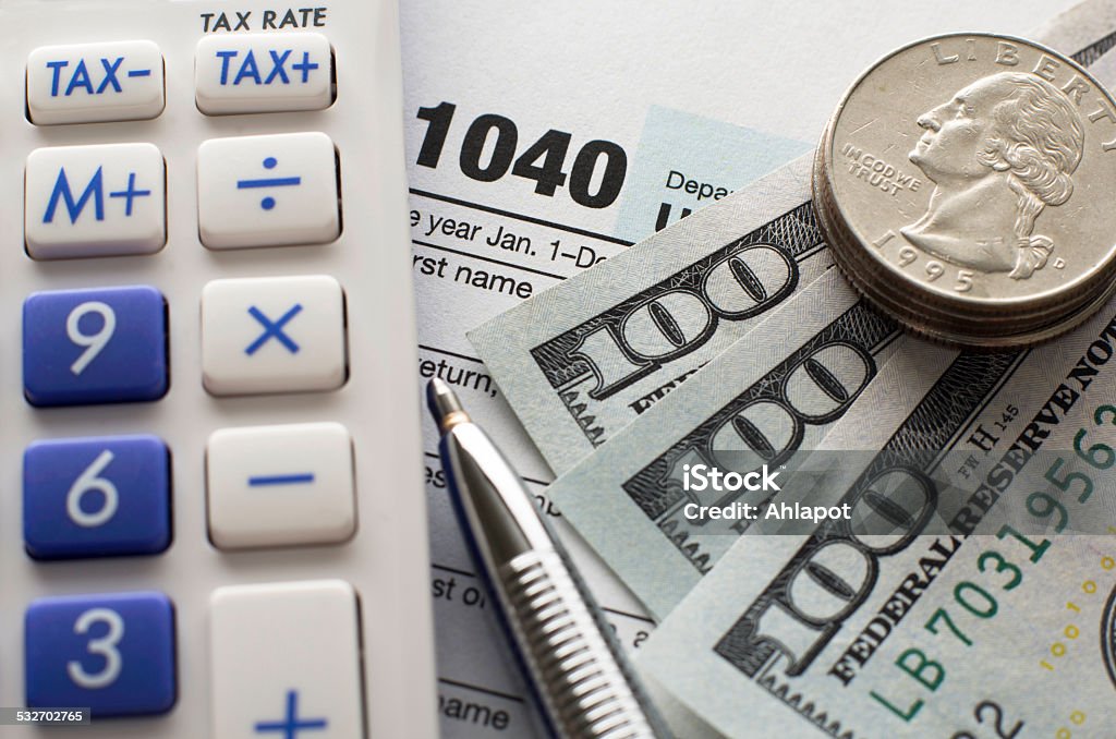 Paying tax This image is perfect for your tax related project. 2015 Stock Photo