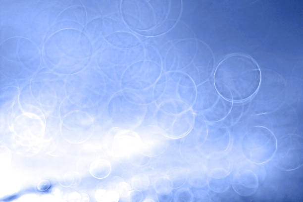 istock abstract concept blue background water drops glare bokeh 532703133