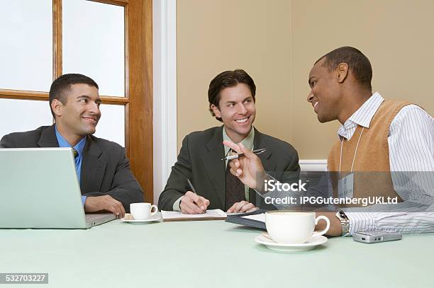 Business People At Meeting Stock Photo - Download Image Now - 2015, 30-34 Years, 30-39 Years