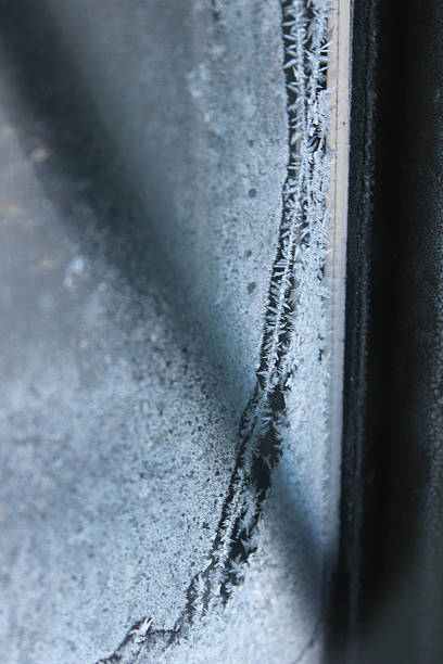 istock Close up of frost crystalization pattern on a window 532703427