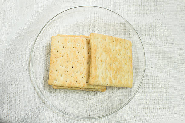 Crackers on dish stock photo