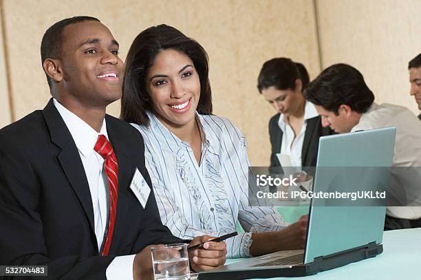 Business People At Meeting Stock Photo - Download Image Now - 2015, 25-29 Years, 30-34 Years
