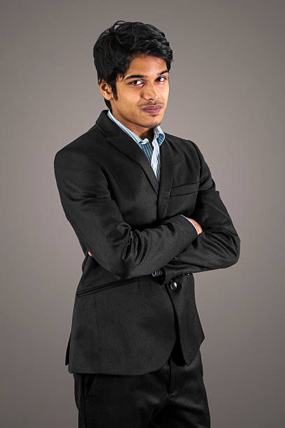 istock young business man posing arms crossed 532705677