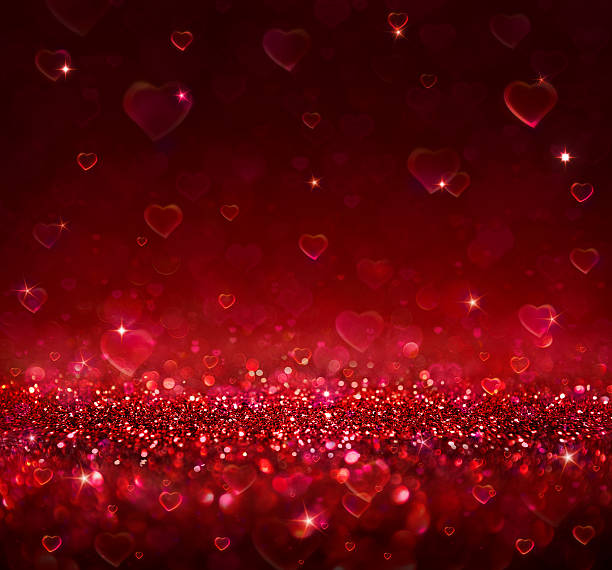 istock romantic valentine background with shining hearts 532705753